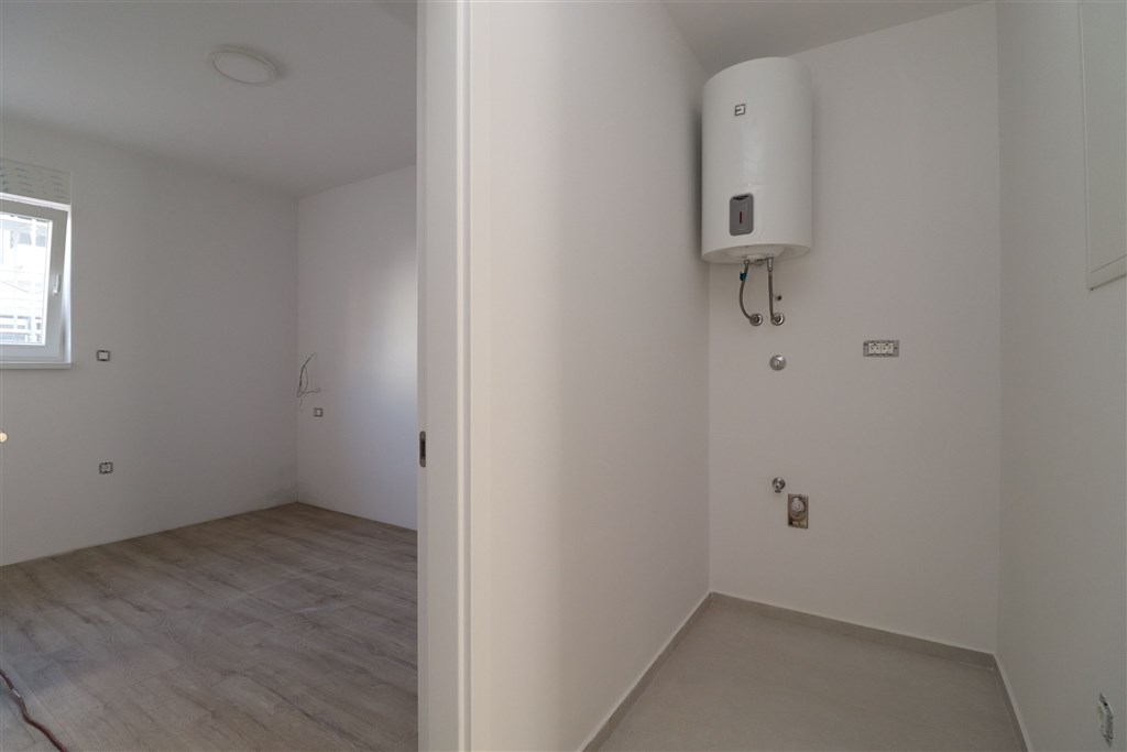 na-prodej-novy-apartman-se-2-loznicemi-a-predzahradkou-vodice-chorvatsko